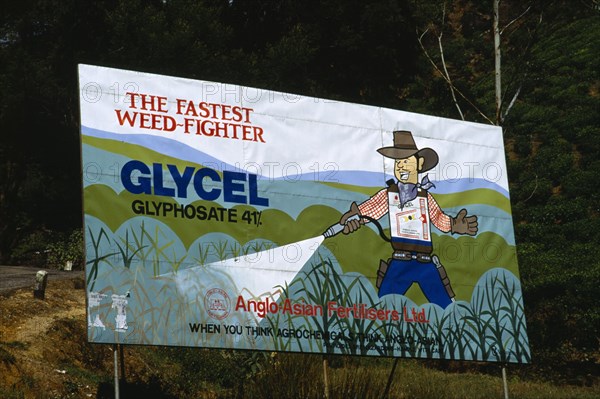 Sri Lanka, Nuwara Eliya, Hand painted billboard poster advertising Glycel weed killer fertiliser from Anglo Asian Fertilisers containing Glyphosate a systemic herbicide originally patented by Monsanto Company as Roundup.