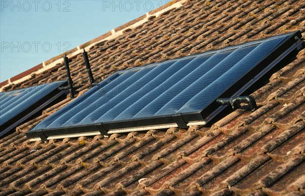 Environment, Energy, Solar Power, Solar panels on the roof of a house.