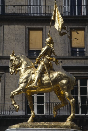 France, Ile de France, Paris, Gilded golden bronze statue of Joan of Arc on horseback in armour carrying her standard by Fremiet in Place des Pyramids in the Tuileries Quarter a focus of pilgrimage for Royalists.