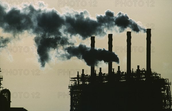 Environment, Pollution, Factory omitting plumes of smoke from chimneys in Santiago, Chile.