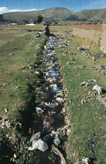 Bolivia, La Paz, Lake Titicaca, Copacabana, Polluted stream.