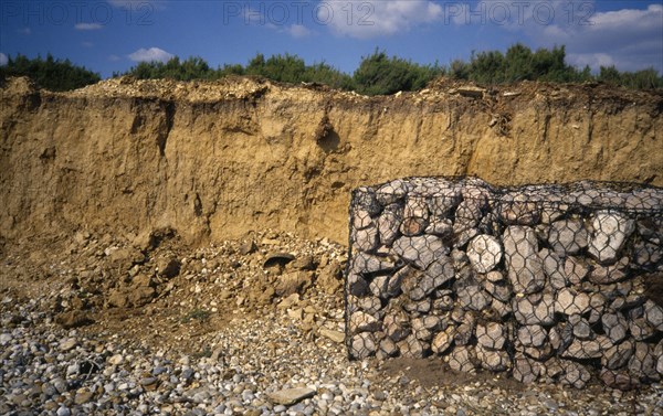 ENGLAND, West Sussex, West Wittering, Rebuilding sea defence to prevent further erosion along south coast shingle beach.