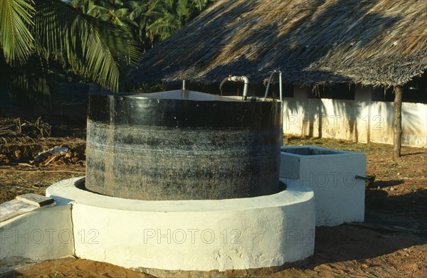 India, Biogas Digester producing methane gas from cattle manure.