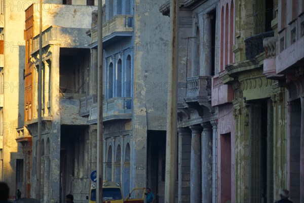 CUBA, Havana, Crumbling exterior facades of buildings along the Malecon.