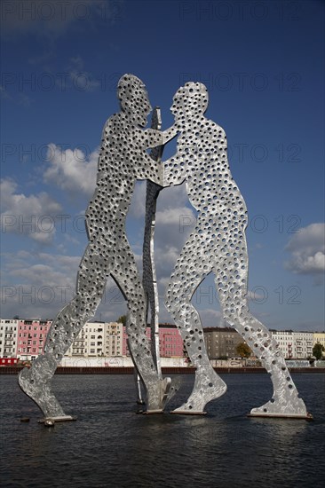 Germany, Berlin, Detail of Molecule Men sculpture 30 metres in height by Jonathan Borofsky on River Spree.