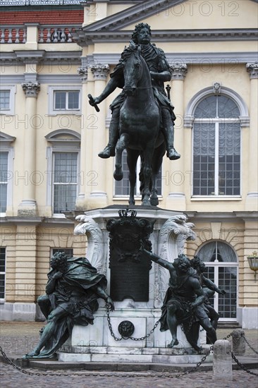 Germany, Berlin, statue of the Great Elector by Andreas Schluter in front of the Charlottenburg Palace.