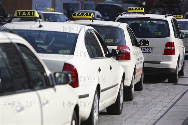 Germany, Berlin, Taxi Rank with cabs waiting for customers.