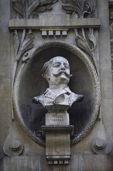 Poland, Krakow, Bust of Julius Mossak on the Palace of Arts built in 1901 for the Society of Fine Arts Friends.