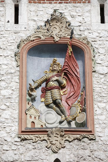 Poland, Krakow, Bas relief of St Florian on St Florian's Gate.