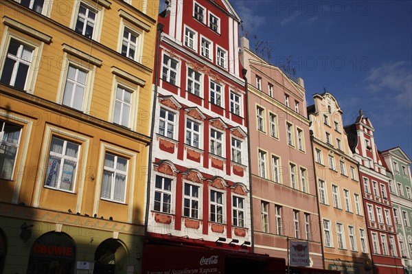 Poland, Wroclaw, pastel coloured building facades in the Rynek old town square.