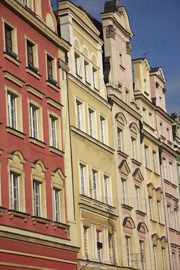 Poland, Wroclaw, pastel coloured building facades in the Rynek old town square.