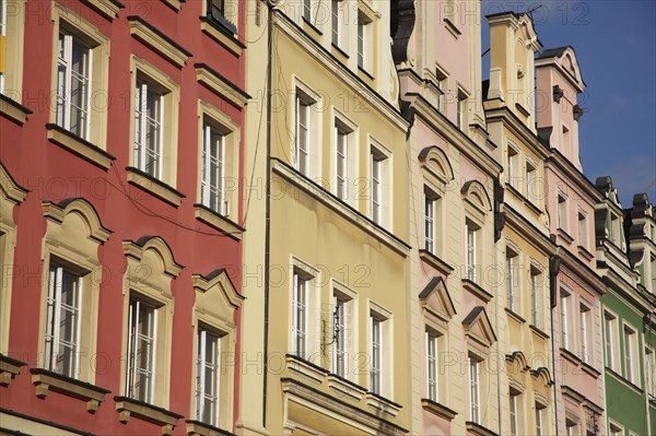 Poland, Wroclaw, pastel coloured building facades in the Rynek old town square.