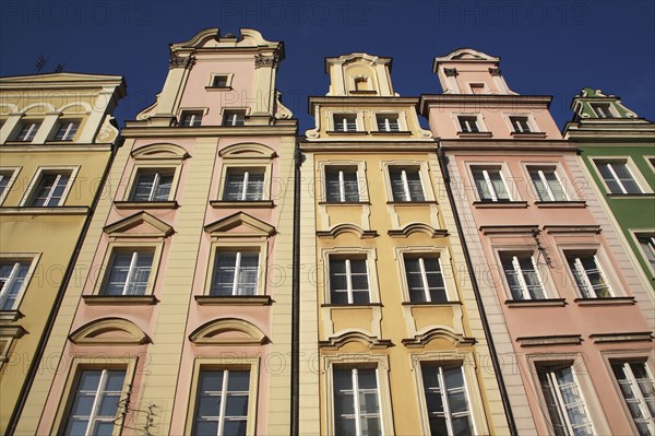 Poland, Wroclaw, pastel coloured building facades in the Rynek old town square.