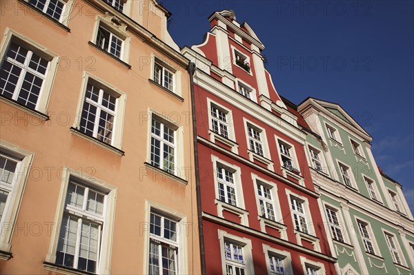 Poland, Wroclaw, pastel coloured building facades in the Rynek old town square.