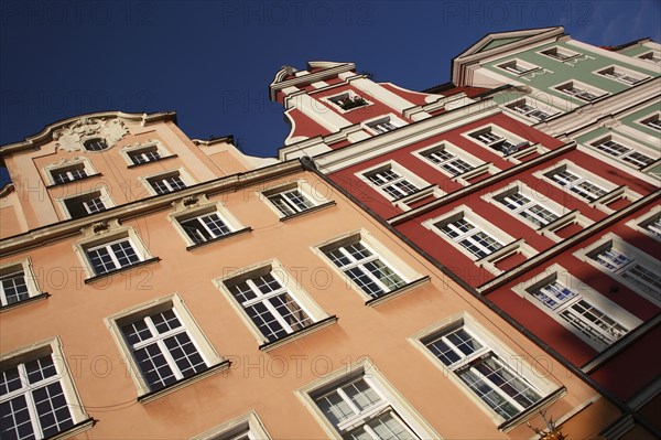 Poland, Wroclaw, pastel coloured building facades in the Rynek old town square.