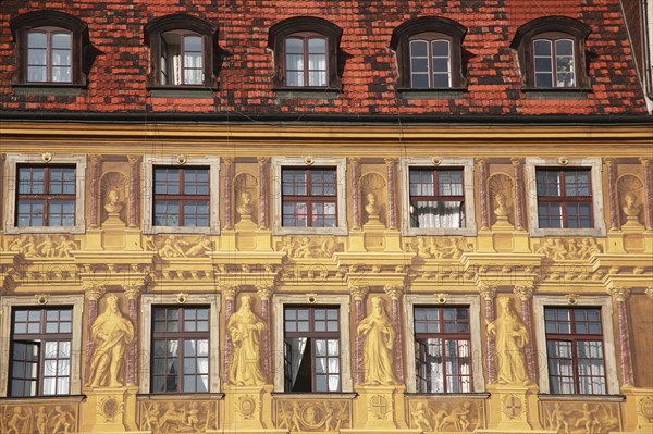 Poland, Wroclaw, detail of building facade with tromp l'oiel painted mural in the Rynek old town square.