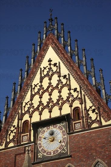 Poland, Wroclaw, Town Hall sundial with with decorative gable.