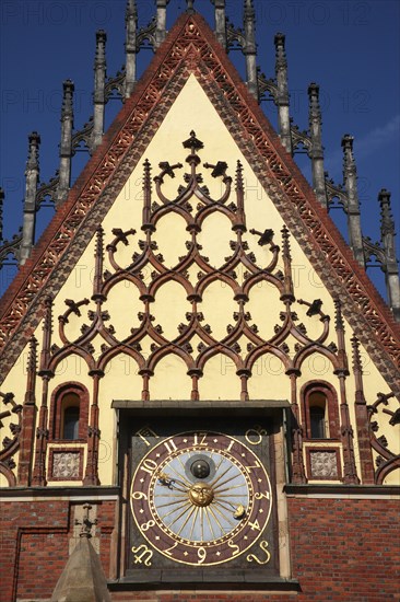 Poland, Wroclaw,Town Hall sundial with with decorative gable.