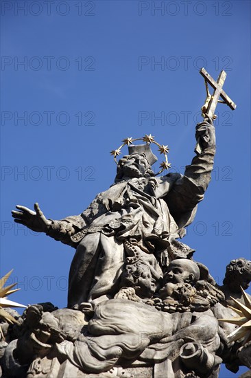 Poland, Wroclaw, baroque statue of St Jan Nepomucen St John Nepomuk made in sandstone by Johann Georg Urbansky in 1732 in front of the Church of the Holy Cross and St Bartholomew.