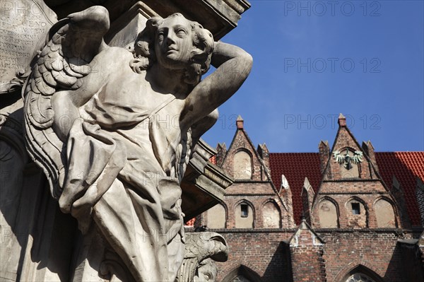 Poland, Wroclaw, Ostrow Tumski, detail of figure at base of baroque monument to the Catholic Martyr John Nepomuk, made in sandstone by Johann Georg Urbansky in 1732 in front of the Church of the Holy Cross and St Bartholomew.