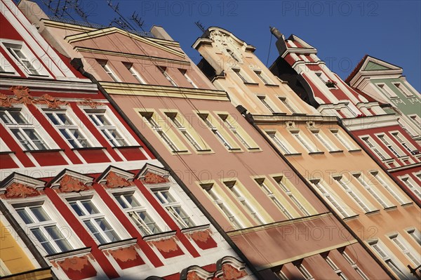 Poland, Wroclaw, pastel coloured building facades in the Rynek old town square.