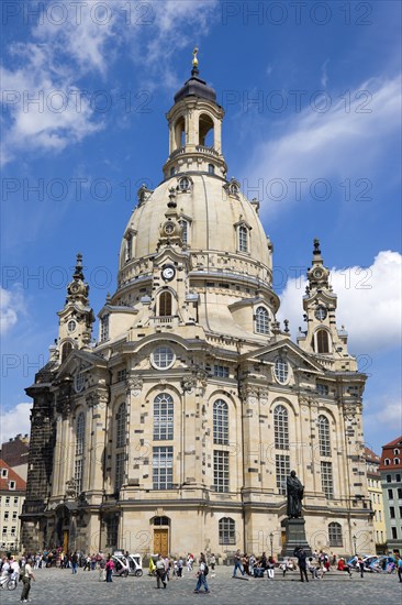 GERMANY, Saxon, Dresden, The restored Baroque church of Frauenkirch Church of Our Lady and surrounding restored buildings in Neumarkt square busy with sightseeing tourists.