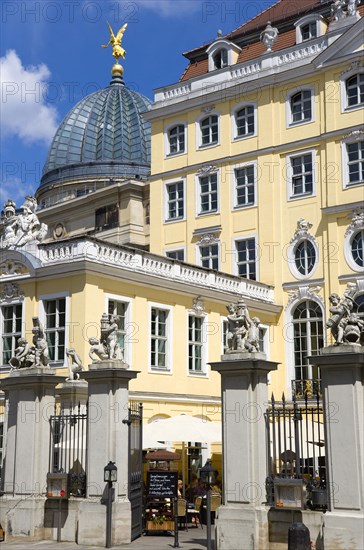 GERMANY, Saxony, Dresden, The glass dome of the Academy of Arts built 1891-94 on the Brühl Terrace by Constantin Lipsius in the style of the Neo-Renaissance behind the Baroque courtyard entrance to the Coselpalais which is now a restuarant in Neumarkt square.