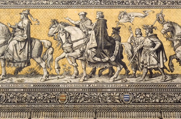 GERMANY, Saxony, Dresden, Fürstenzug or Procession of the Dukes in Auguststrasse a mural on 25,000 Meissen tiles that depicts 35 noblemen from the 12th century Konrad the Great, to Friedrich August III, Saxony's last king, who ruled from 1904-1918. It was originally painted by Wilhelm Walter between 1870 and 1876 but eventually, the stucco began to crumble and around 1906-07 it was replaced by the tiles.