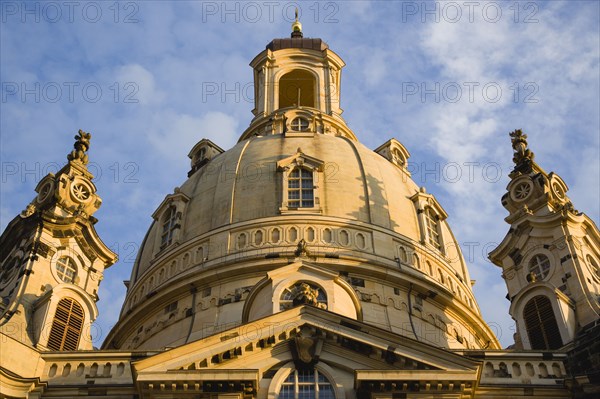 GERMANY, Saxony, Dresden, Detail in evening light of the Baroque Frauenkirche Church of Our Lady in Neumarkt square with dome and belltowers.