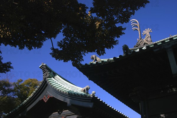 Japan, Tokyo, Kanda- Yushima Seido Confucian Shrine, details of roof wall surrounding  shrine compound, distictive black color and guardian tiger and dragon guardian figures
January 10, 2010
c Jon Burbank