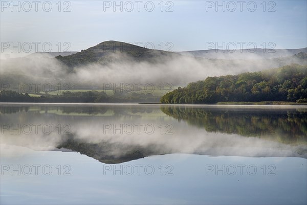 IRELAND, County Cavan, Lough MacNean, Islands in the lough on an autumn morning.