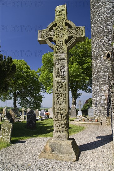 IRELAND, County Louth, Monasterboice Monastic Site, The West Cross is one of the tallest High Crosses in Ireland at 6.5 metres, view of east face.