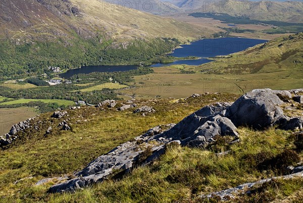 IRELAND, County Galway, Connemara, Diamond Hill, view of Kylemore Abbey and Kylemore Lough from summit of Diamond Hill.