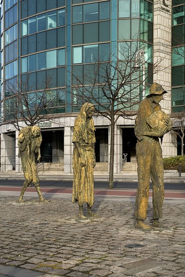 IRELAND, County Dublin, Dublin City, Famine Memorial  The sculpture is dedicated to a million Irish people forced to emigrate during the 19th century Irish Famine, bronze sculptures were designed and crafted by Dublin sculptor Rowan Gillespie, presented to the City of Dublin in 1997.