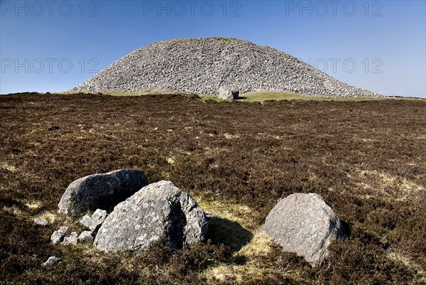 IRELAND, County Sligo, Knocknarea Mountain, Queens Maeves Cairn on summit of the mountain.