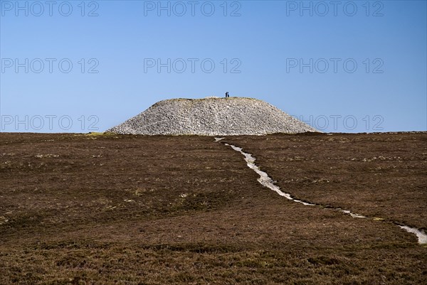IRELAND, County Sligo, Knocknarea Mountain, Queens Maeves Cairn on summit of the mountain.