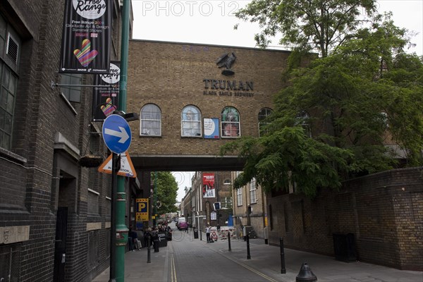ENGLAND, London, East End, Whitechapel, Brick Lane, View of the old Truman brewery factory, which is now converted into an art gallery space.