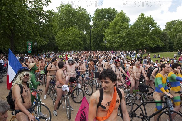 ENGLAND, London, Hyde APrk, Naked people riding their bicycles on formation at Hyde Park while participating at the world naked bike ride protest parade.