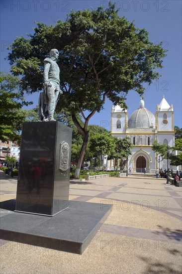 VENEZUELA, Margarita Island, Porlamar, C Vellazquez and C Manno, Simon Bolivarís sculpture at Plazza Bolivar Square just in front of the cathedral at Porlamar city, shoot on a bright day with blue sky.