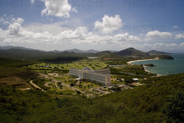 VENEZUELA, Margarita Island, East Coast, View from above of the luxurious hotel Hesperia premises and its facilities, shoot on a bright day with blue sky and white clouds.