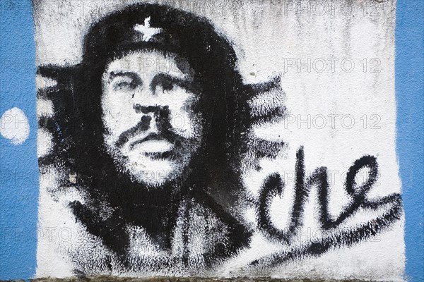 VENEZUELA, Margarita Island, La Asuncion, Che Guevara graffiti portrait on a wall just outside the Castillo de Santa Rosa fort.