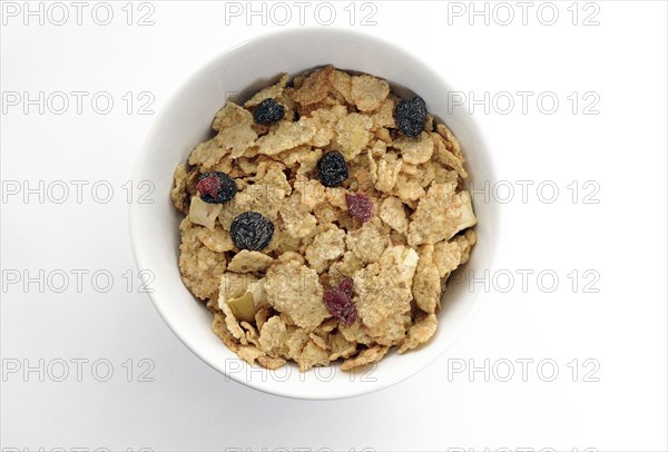 FOOD, Breakfast, Cereal, bowl of cereal flakes with dried fruits.