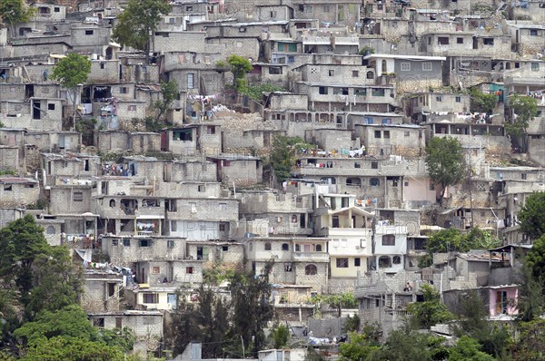 HAITI, Isla de Laganave, Slum housing on hillside.