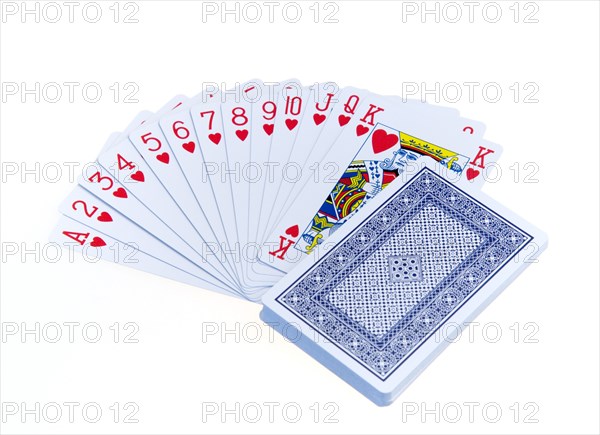 Toys, Games, Playing Cards, Cards in the suit of hearts fanned out in numerical order with the remaining deck face down against a white background.