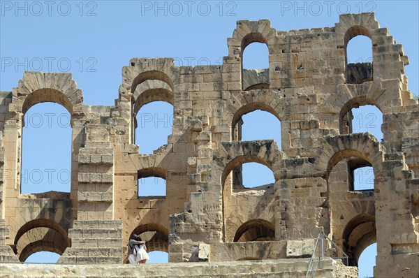 Tunisia, El Jem, Roman Colosseum with tourists.