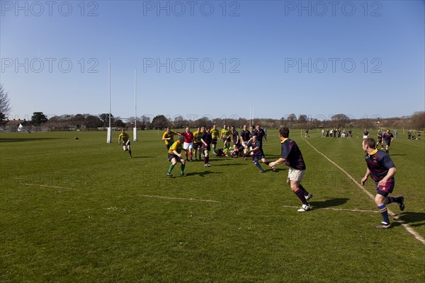 England, West Sussex, Shoreham-by-Sea, Rugby Teams playing on Victoria Park playing fields.