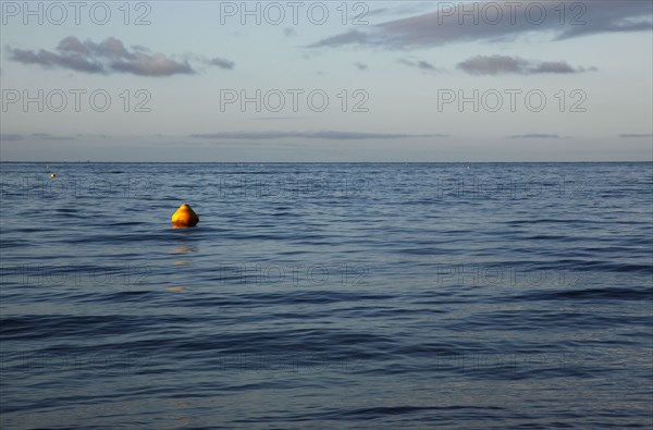 England, West Sussex, Goring-by-Sea, Worthing Triathlon 2009, yellow buoys marking our swim course.