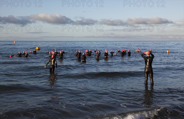 England, West Sussex, Goring-by-Sea, Worthing Triathlon 2009, women at the start of the swim section.