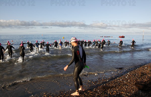 England, West Sussex, Goring-by-Sea, Worthing Triathlon 2009, women at the start of the swim section.