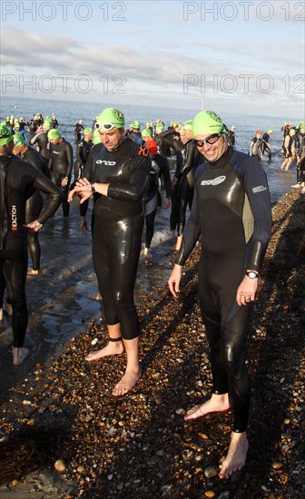 England, West Sussex, Goring-by-Sea, Worthing Triathlon 2009, male competitors at the swim start.